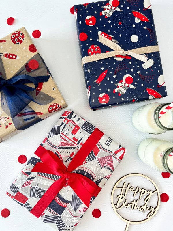 Wrapping paper featuring whimsical castles in taupe, navy, and red, perfect for elegant gift presentations.