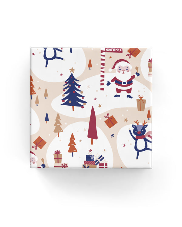 Vibrant Happy Santa wrapping paper roll (60cm) featuring playful Santa, perfect for festive gift-giving. Eco-friendly and abundant.