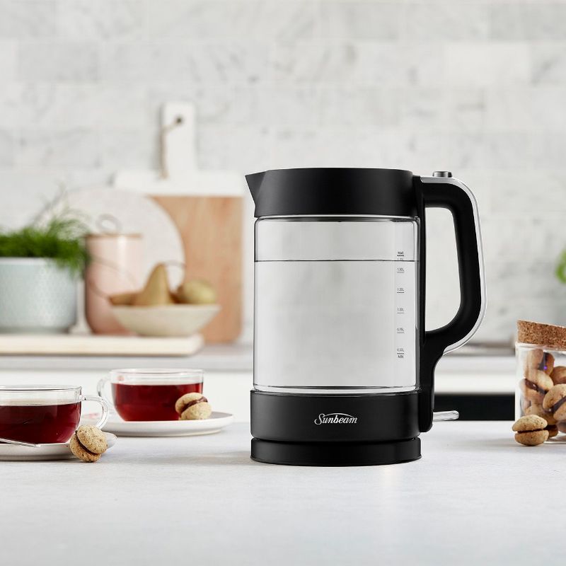 Black Sunbeam Classics Glass Kettle with 1.7L capacity, 2200W fast heating, and cool blue illumination for stylish boiling.