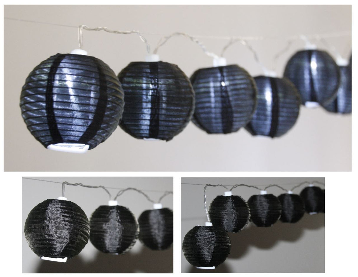 Set of 24 black mini paper lanterns with LED lights, perfect for elegant decorations at events and gatherings.