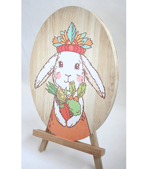 Whimsical oval plywood wall art featuring a tribal bunny princess, perfect for kids' rooms or playful decor enhancements.