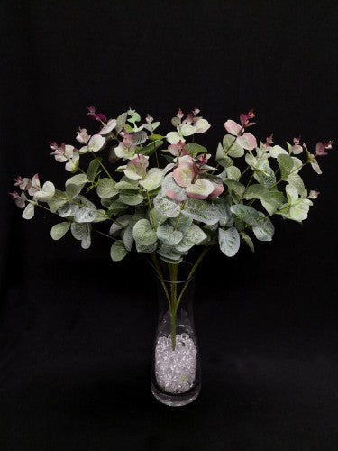 Lifelike green and red Eucalyptus bush, perfect for low-light decor, adds elegance without maintenance.