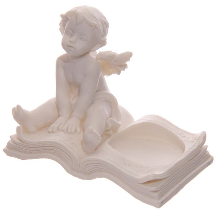 Set of 4 cherub tea light candle holders, intricately designed sitting on books, perfect for elegant home decor.