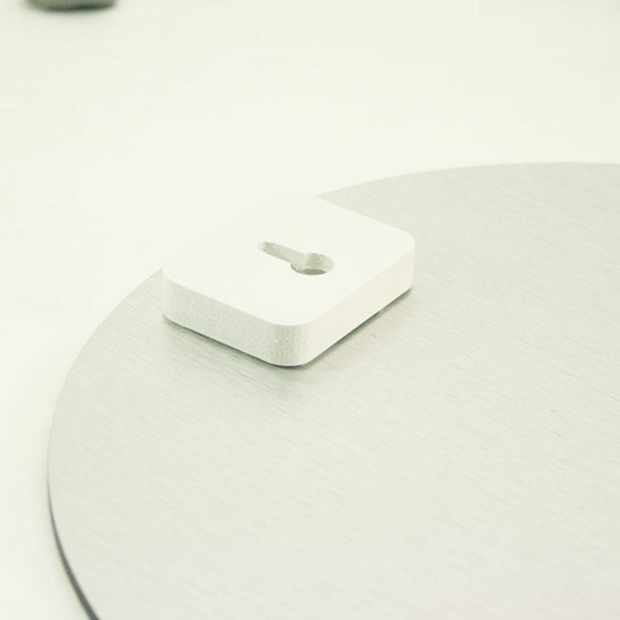 Frond Art Circle - Wall Art featuring a 300mm diameter design in durable ACM, blending modern elegance with Kiwiana charm.