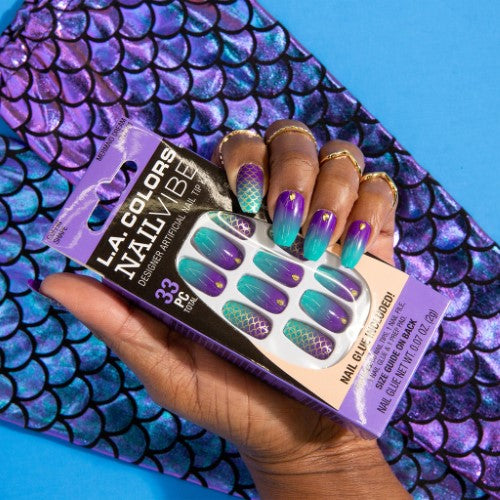 Mermaid-inspired artificial nail tip kit with 33 durable, flexible tips for a salon-quality manicure at home.