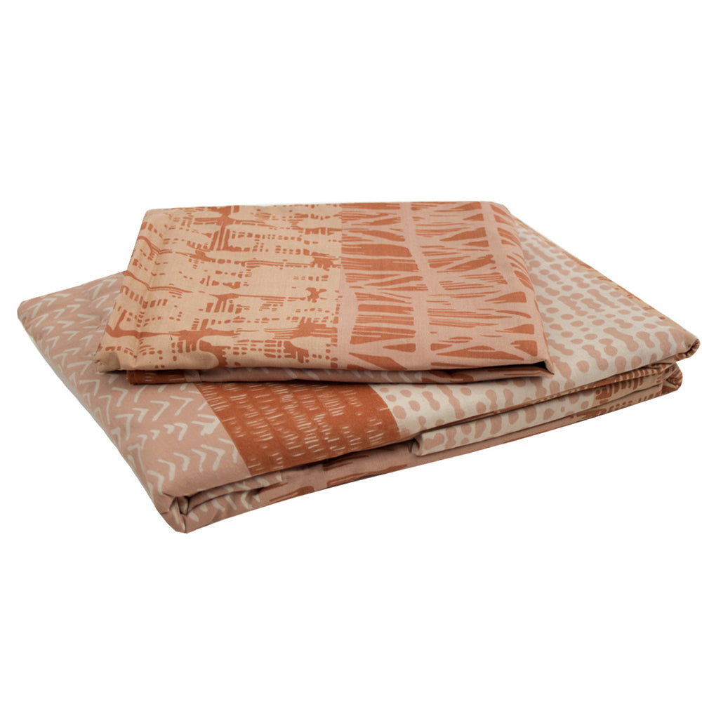 Elegant terracotta quilt cover set with geometric patterns, designed for durability and easy care, perfect for any bedroom.