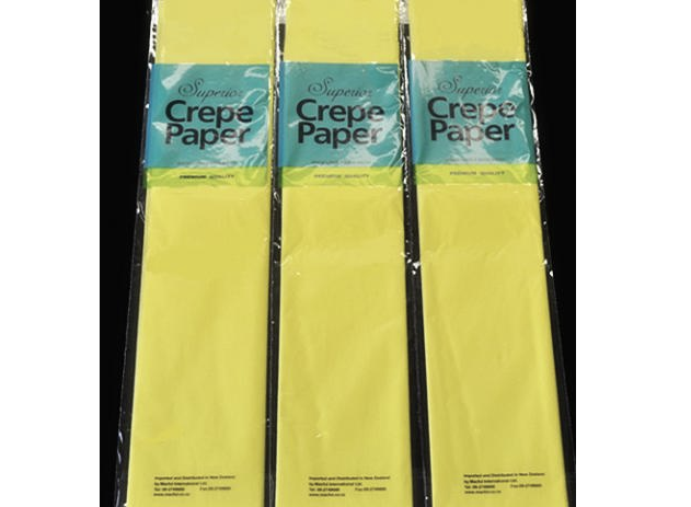 Bright yellow crepe paper roll, 12 meters long, perfect for crafts, decorations, and DIY projects with durability and flexibility.