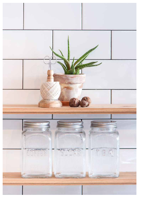 Stylish ribbed glass canisters with metal lids for tea, coffee, and sugar, perfect for kitchen storage (1.2L).