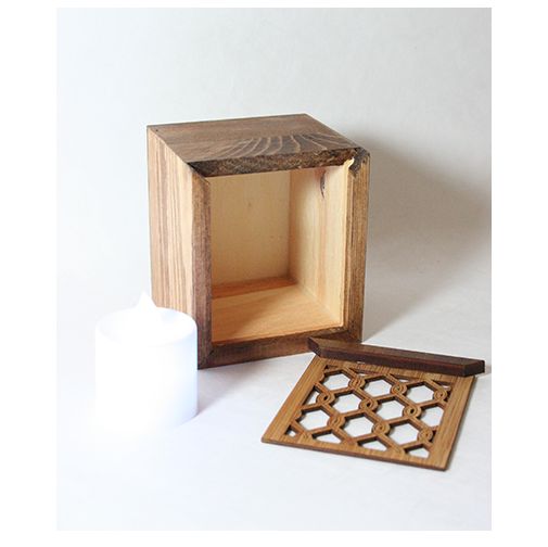LED tealight box made of bamboo veneer, features color-changing candle, and doubles as a trinket box.