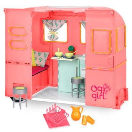 Our Generation R.V. Seeing You Camper in pink, perfect for 18-inch dolls, features a kitchen, picnic stools, and cozy bed.