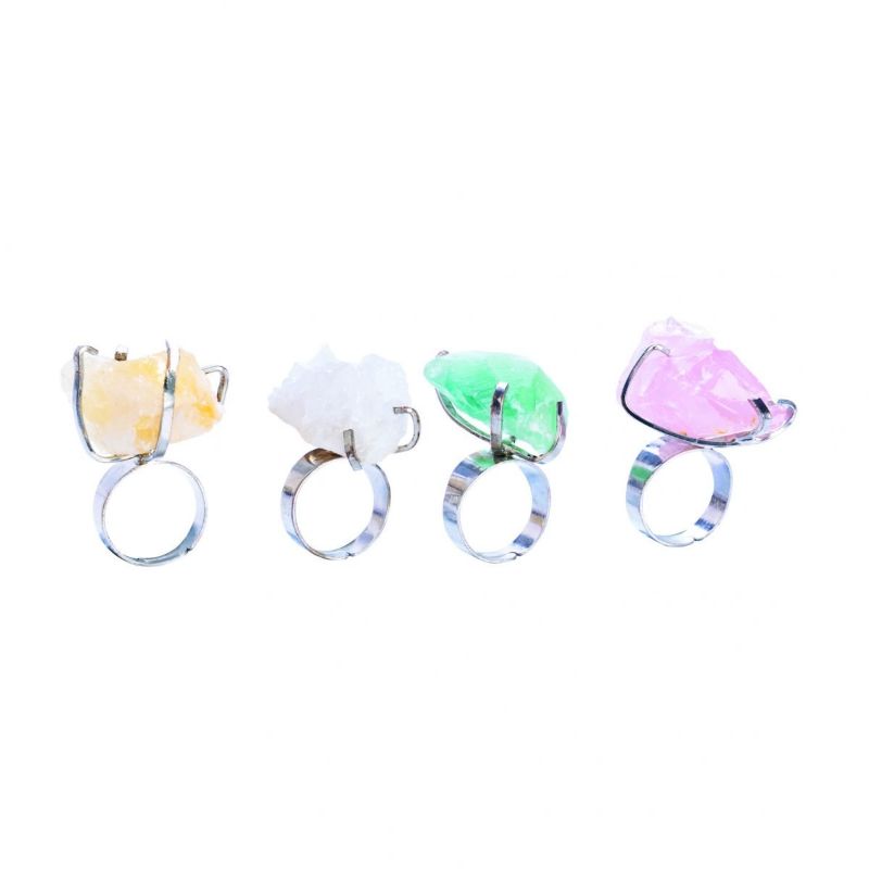 Assorted Gemstone Rough Filigree Rings in pastel orange, white, turquoise, and pink with silver bands and claw settings.
