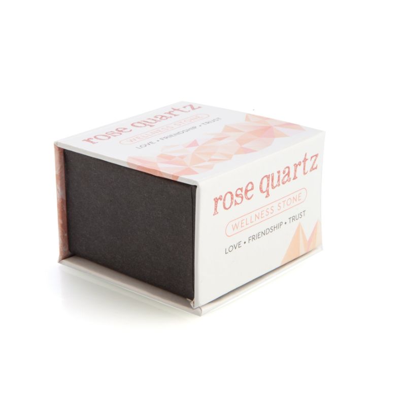 Raw rose quartz stone in a magnetic gift box, promoting love and emotional healing, measuring 5 cm wide.