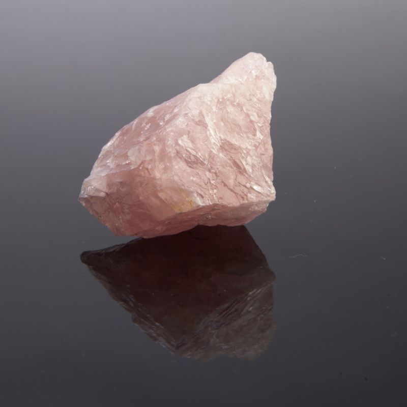Raw uncut rose quartz stone in a gift box, promoting love and emotional healing, measuring 5 cm wide.