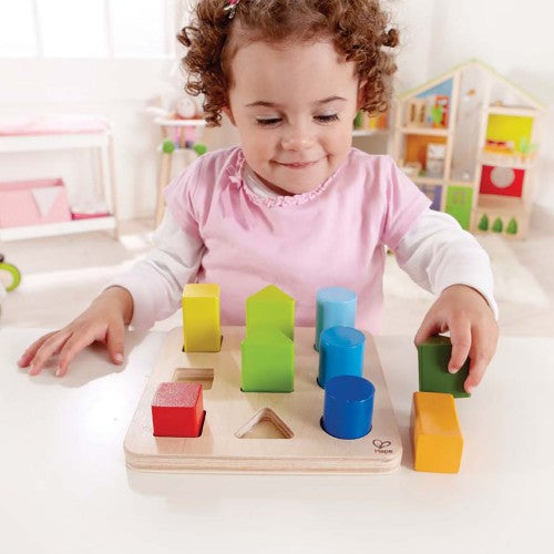 Colorful Hape Colour And Shape Sorter Blocks designed for toddlers to enhance sorting, counting, and fine motor skills.