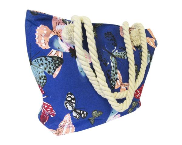 Stylish Blue Butterflies Tote Bag, perfect for beach, shopping, or overnight trips, with lined compartments and sturdy handles.