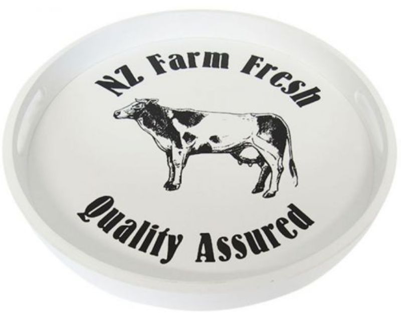 Stylish black and white wooden tea tray with a charming cow motif, perfect for farmhouse decor and serving snacks.