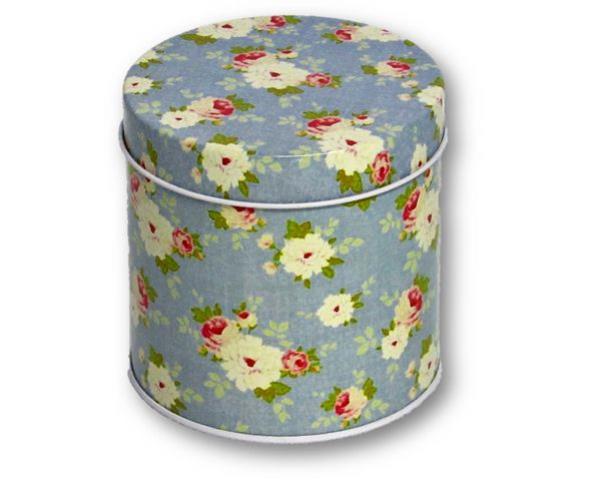 Round tin with a vibrant blue floral design, perfect for storing trinkets, sweets, or organizing decor.