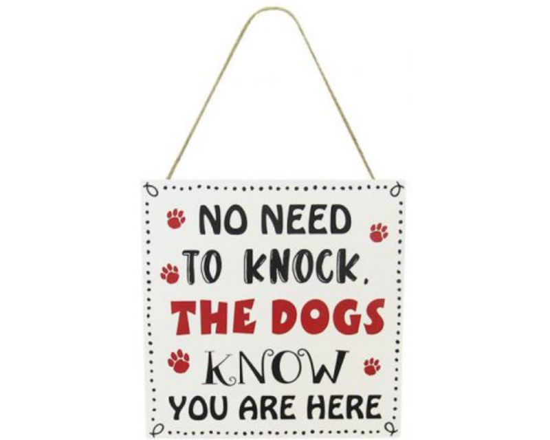 Wooden "Dogs Know" sign with twine hanger, perfect for dog lovers' home decor, measuring 20 x 9 cm.