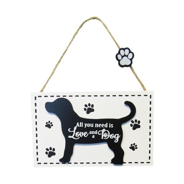 Charming MDF wall art sign featuring a paw print design, celebrating the love for dogs in any home decor.