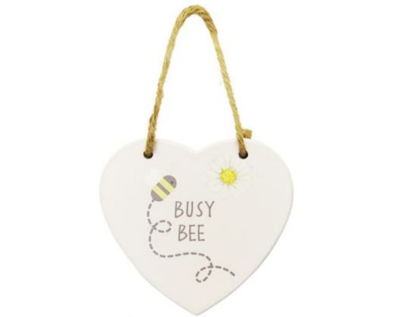 Heart-shaped wooden sign with twine hanger featuring a bee design, perfect for rustic farmhouse decor.