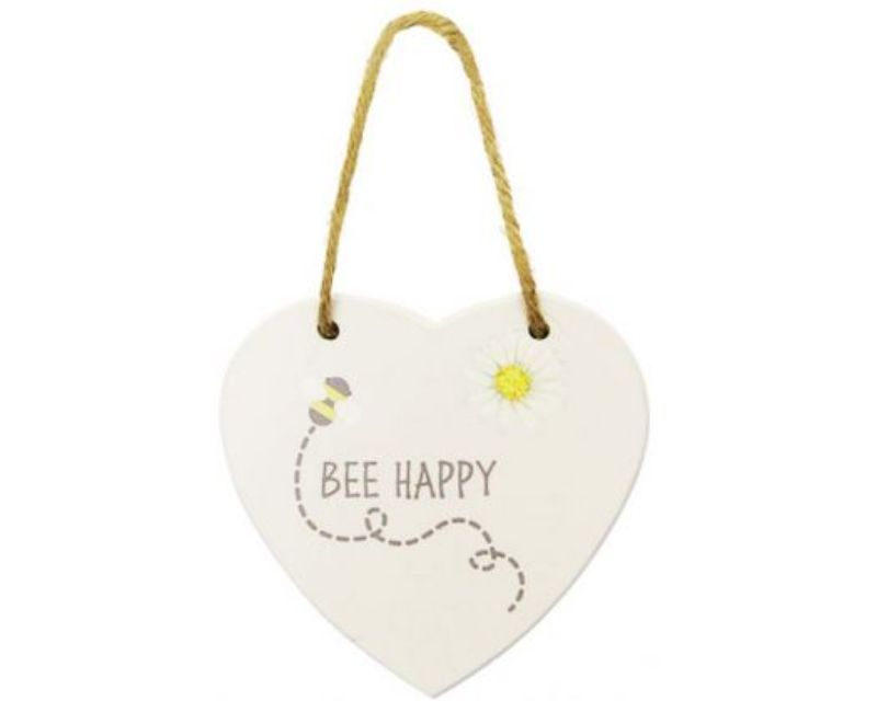 Heart-shaped wood sign featuring a bee motif and twine hanger, perfect for rustic home decor and nature lovers.