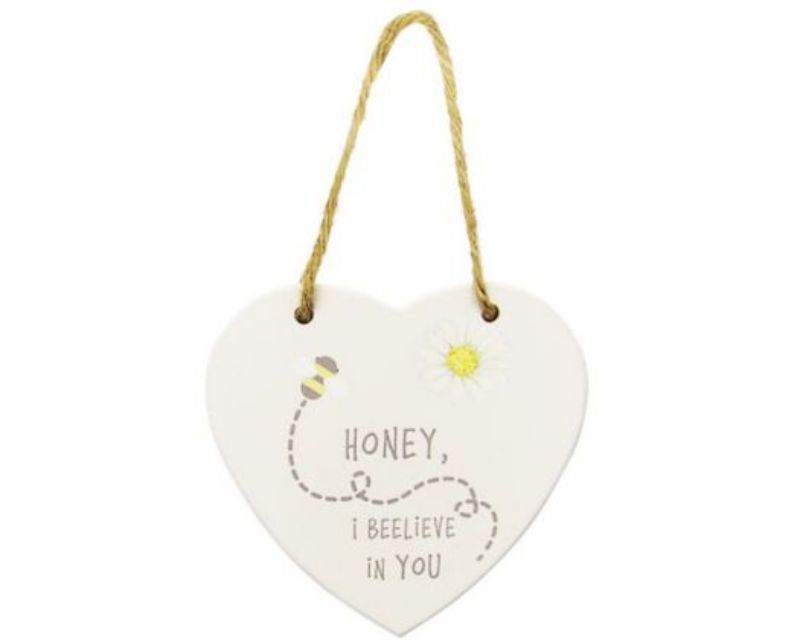 Heart-shaped wooden wall decor with twine hanger featuring the quote "Bee-lieve in Yourself," perfect for bee lovers.