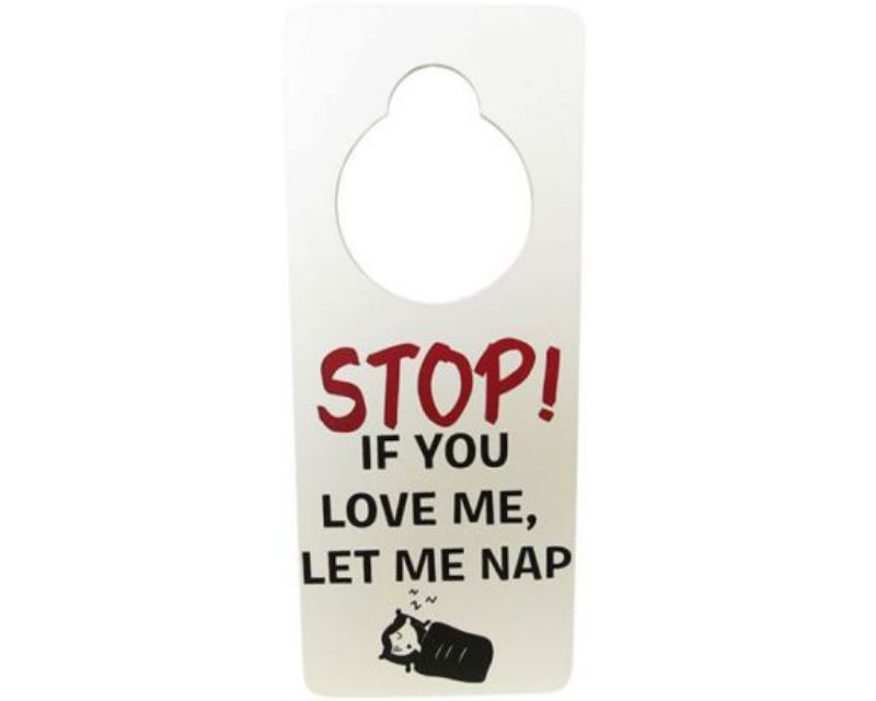 Door sign reading "Nap Time" in playful design, measures 24cm by 10cm, perfect for quieting sleeping children.