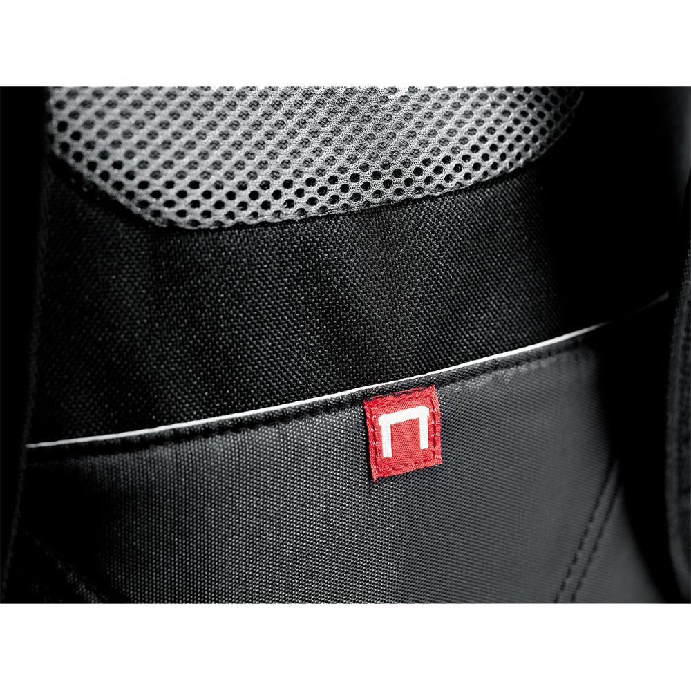 Checkpoint-friendly backpack with designated laptop section, multiple pockets, and ergonomic design for easy transport.