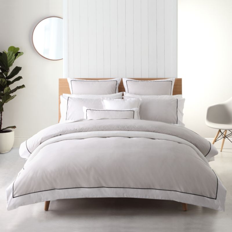 Elegant queen duvet cover set in Essex Pewter with herringbone pattern, white border, and black piping trim.