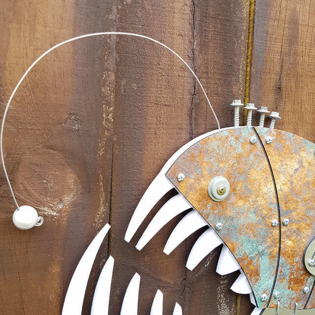 Layered fish wall art showcasing a 3D design, ideal for fishing decor, carefully crafted from mixed materials.