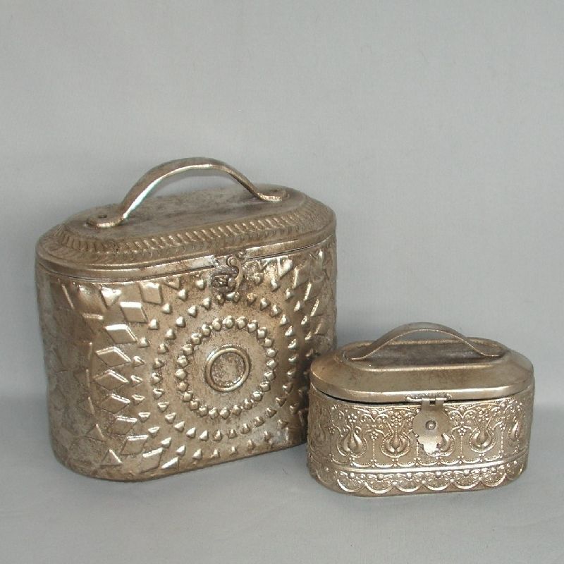 Elegant domed silver metal boxes (set of 2) for storage and décor, perfect for organizing jewelry and trinkets.