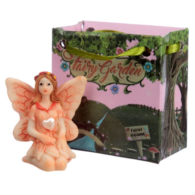Assorted gemstone fairies in mini gift bags, perfect for memorable gifts and enchanting home decor accents.