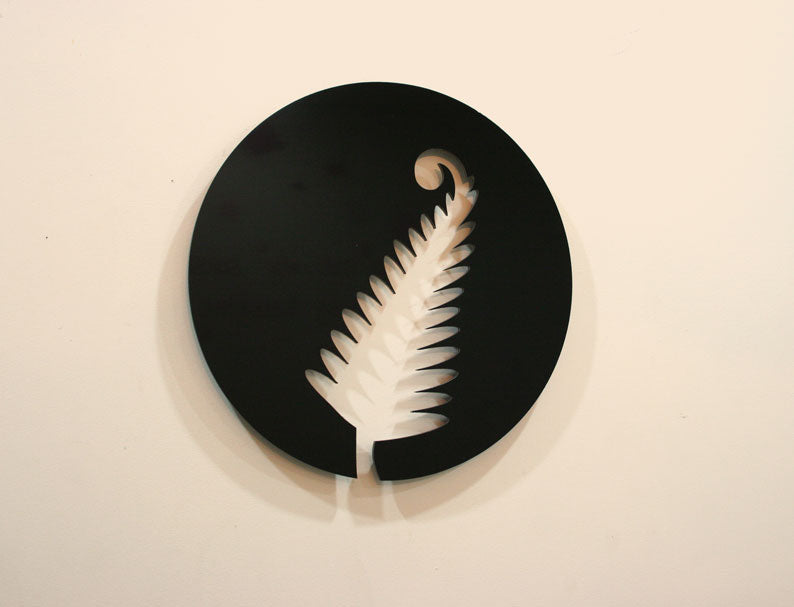 Fern Art Circle - Kiwiana Wall Art featuring a vibrant fern design, 300mm diameter, ideal for indoor or outdoor decor.