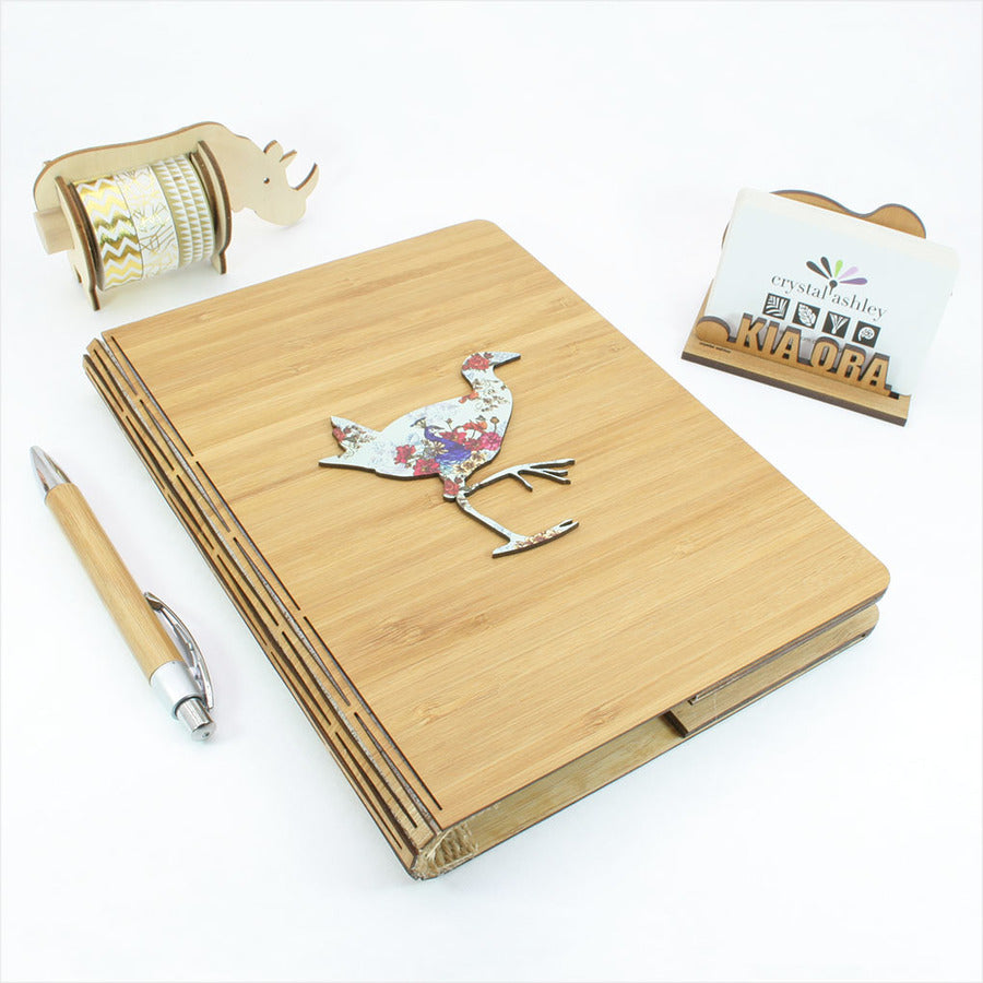 Eco-friendly A5 Bamboo Journal with printed floral pukeko design, perfect for journaling and creative inspiration.