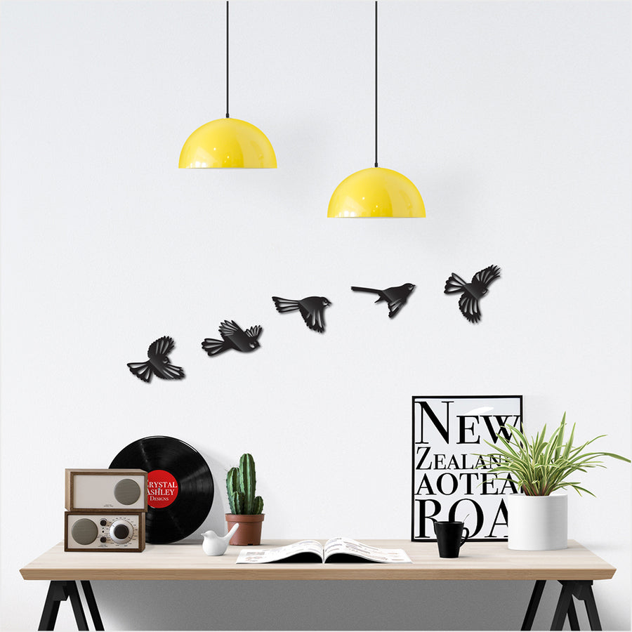 Kiwiana wall art featuring a vibrant flock of fantails in durable ACM, perfect for home decor or as a gift for bird lovers.