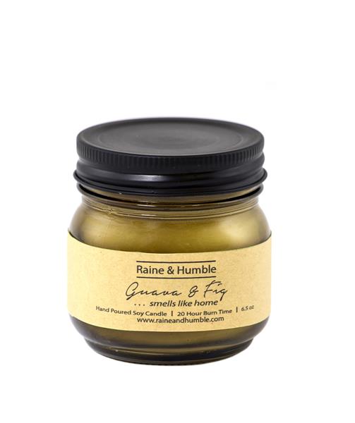 Hand-poured soy candle in a heat-resistant glass, featuring sweet guava and ripe fig scents, with a 20-hour burn time.