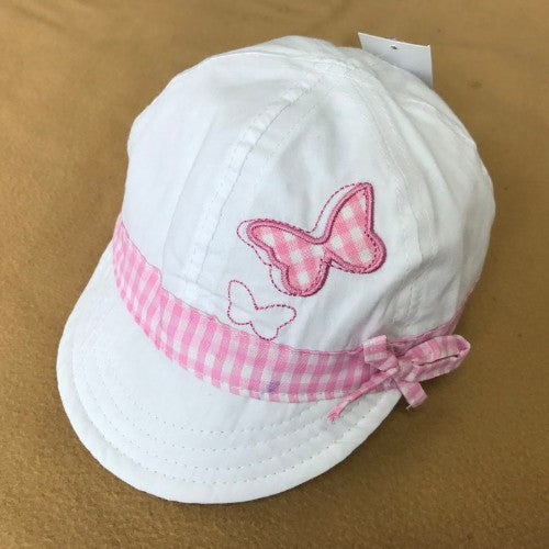 Soft pink butterfly decoration on white background, perfect for nursery decor and baby shower gifts for ages 6-12 months.
