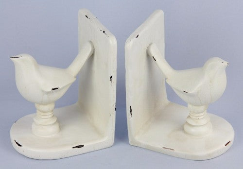 White bird bookends made of polyresin, measuring 25x10.5x15.8 cm, perfect for stylishly organizing books.