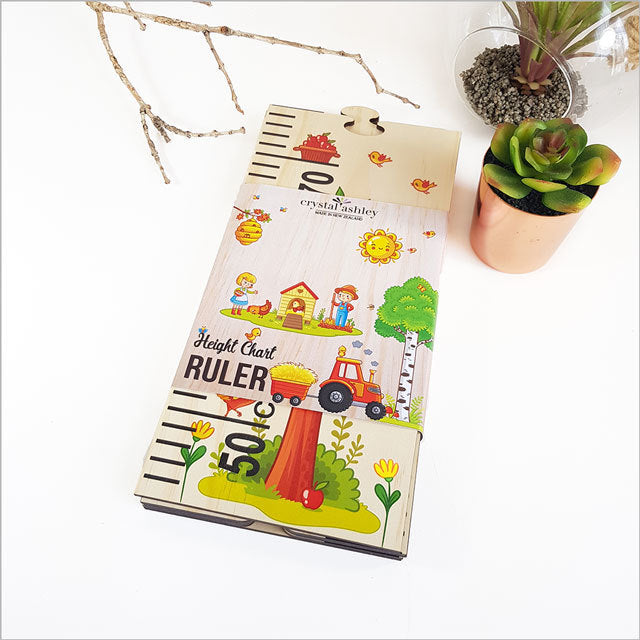 Farm Life Growth Chart Ruler in natural wood, measuring up to 195cm, featuring engaging puzzle pieces and charming nursery decor.
