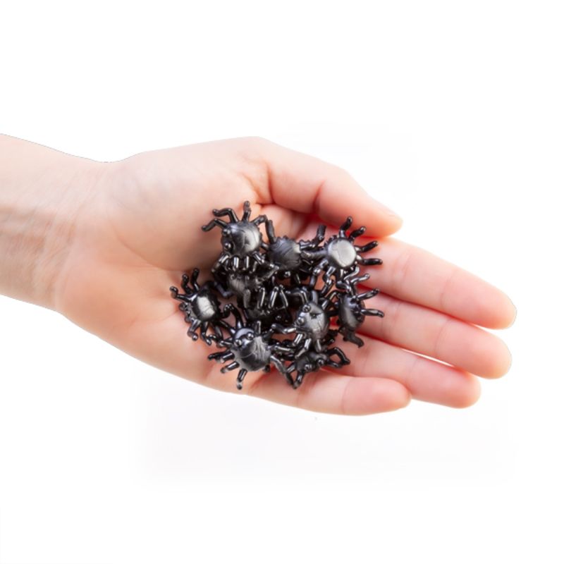 Squishy black spider toys that crawl, clump, and stick to walls, perfect for parties and imaginative play.