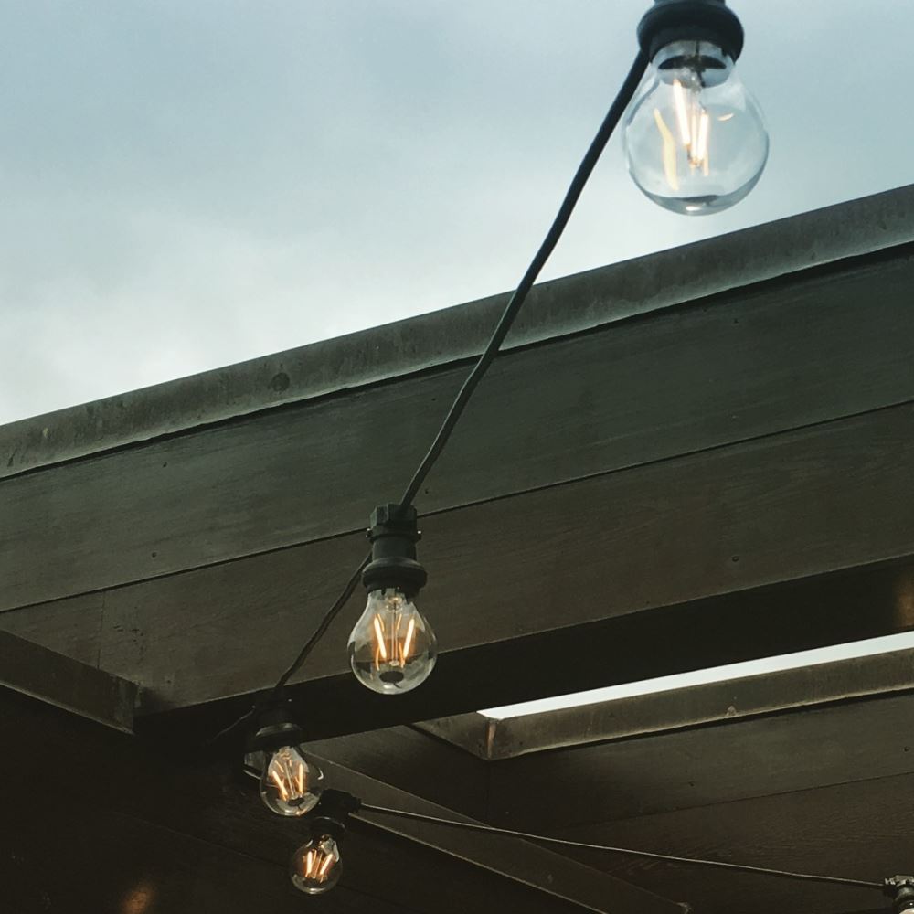 Festoon party lights with 14 LED bulbs on a 10M durable wire, perfect for indoor and outdoor celebrations.