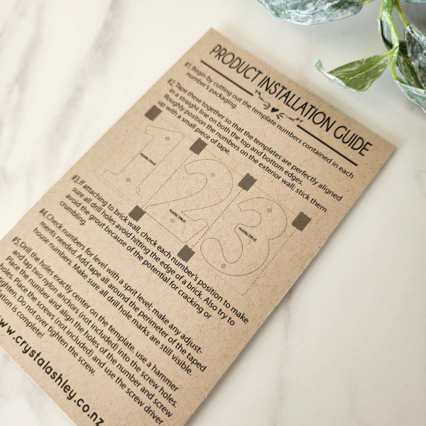 Elegant NZ Floral house number "0" on white acrylic, 12cm size, includes mounting template and pre-drilled holes for easy installation.