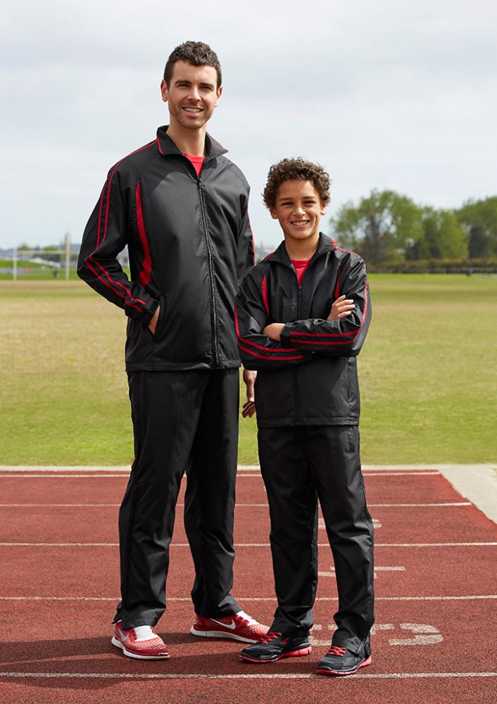 Adults Flash Track Pant in black, 2XL, featuring showerproof fabric, elastic waist, and multiple pockets for outdoor comfort.