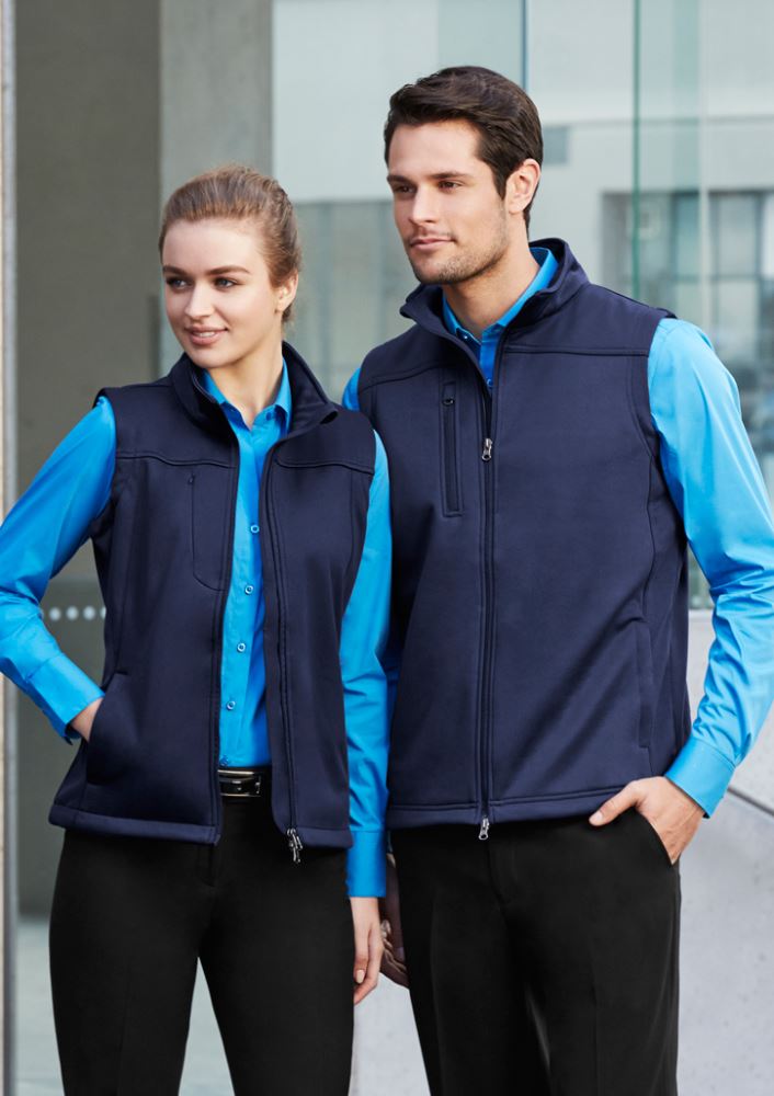 Men's Navy Soft Shell Vest in size L with fleece lining, dual zip pockets, and water-repellent, breathable fabric.
