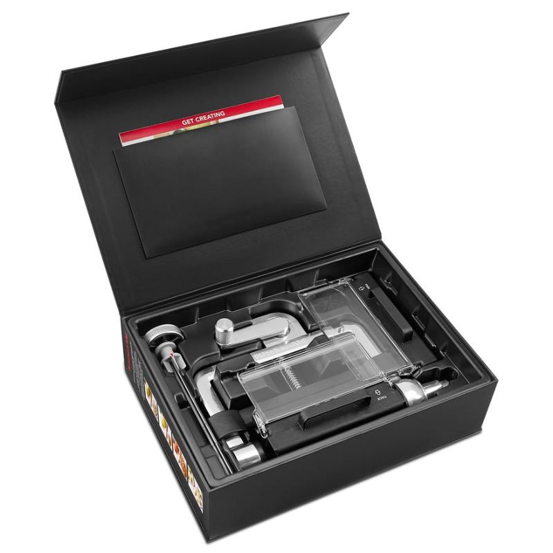 KitchenAid Vegetable Sheet Cutter attachment, designed for making thin sheets of fruits and vegetables for creative cooking.