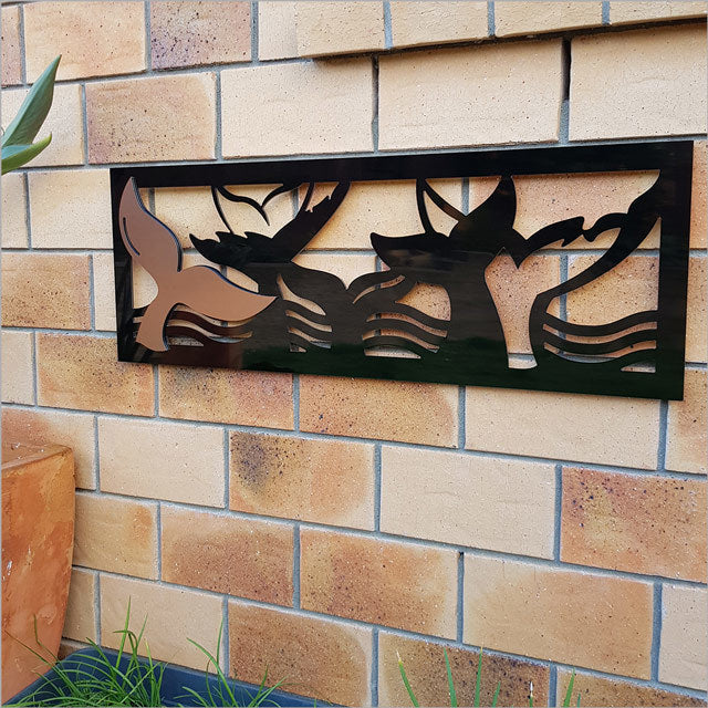 Large black and copper wall art depicting Tohora, perfect for indoor/outdoor decor, celebrating Kiwiana culture.