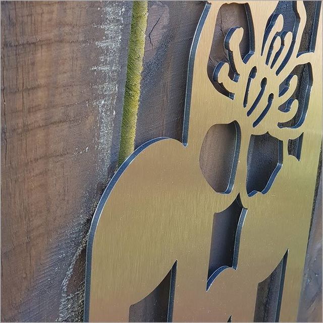 Large Koru Manuka brushed copper wall art, 790mm tall, features intricate koru fern designs for indoor/outdoor decor.