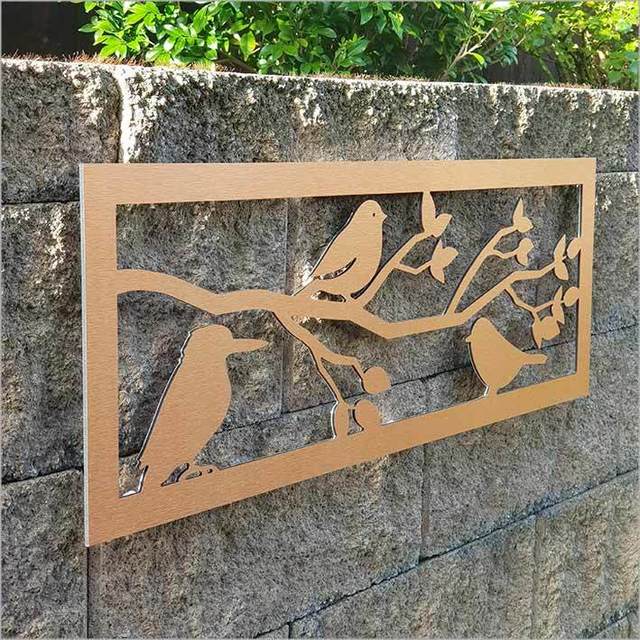 Large brushed copper wall art panel featuring three birds, perfect for indoor or outdoor decor, measuring 790mm x 285mm.
