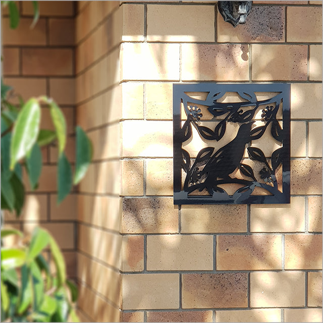 Large square wall art featuring a detailed tui on a black background, perfect for Kiwiana home decor.