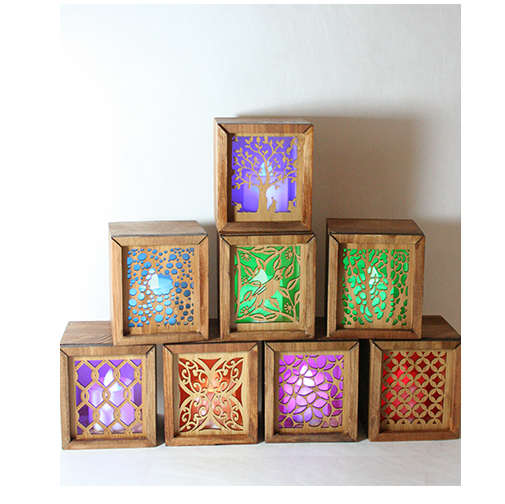 LED tealight box made of laser cut bamboo with a color-changing candle, also doubles as a trinket box.